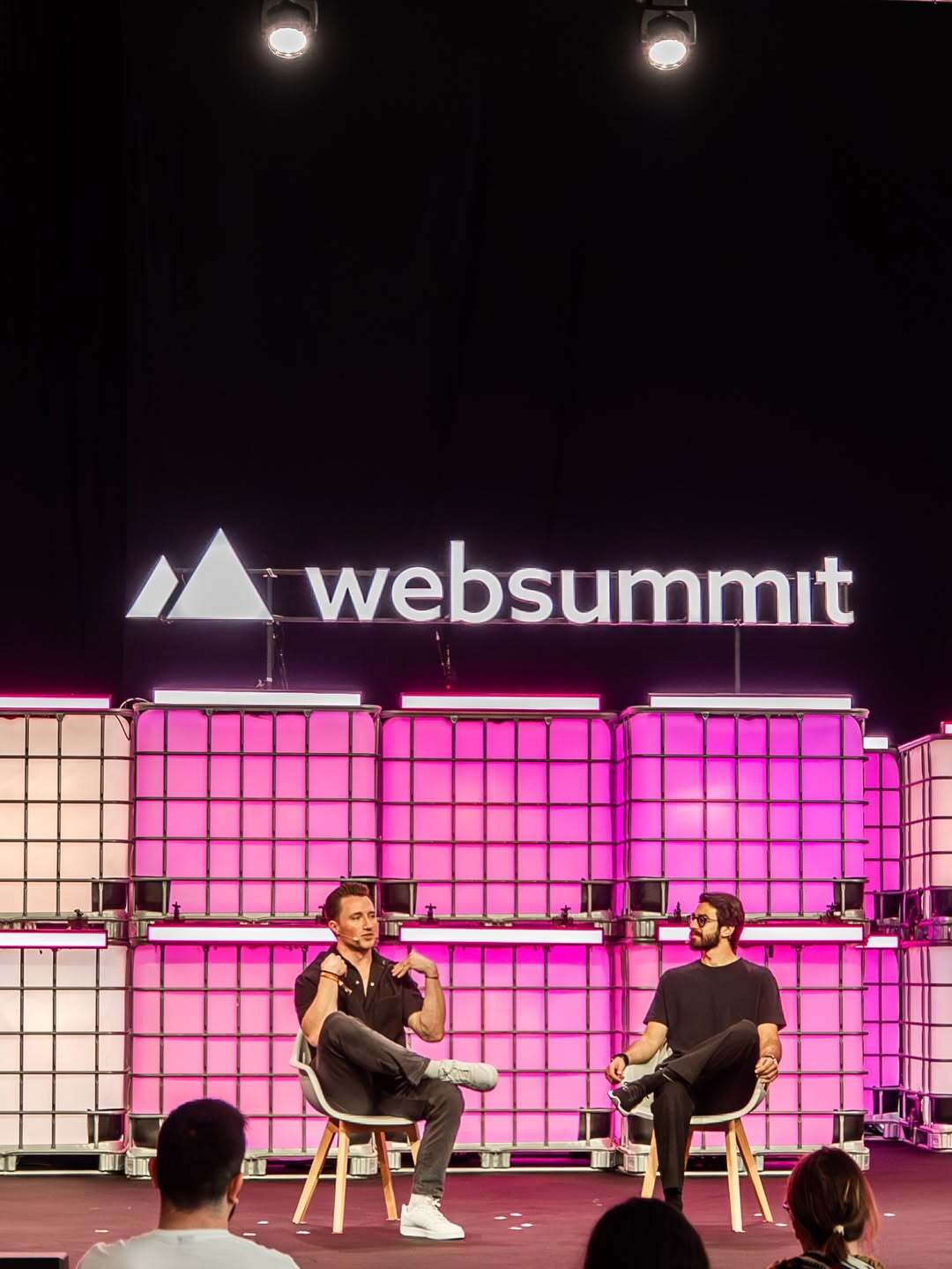 Kevin Cooney speaking on stage with Stefano Fallaha