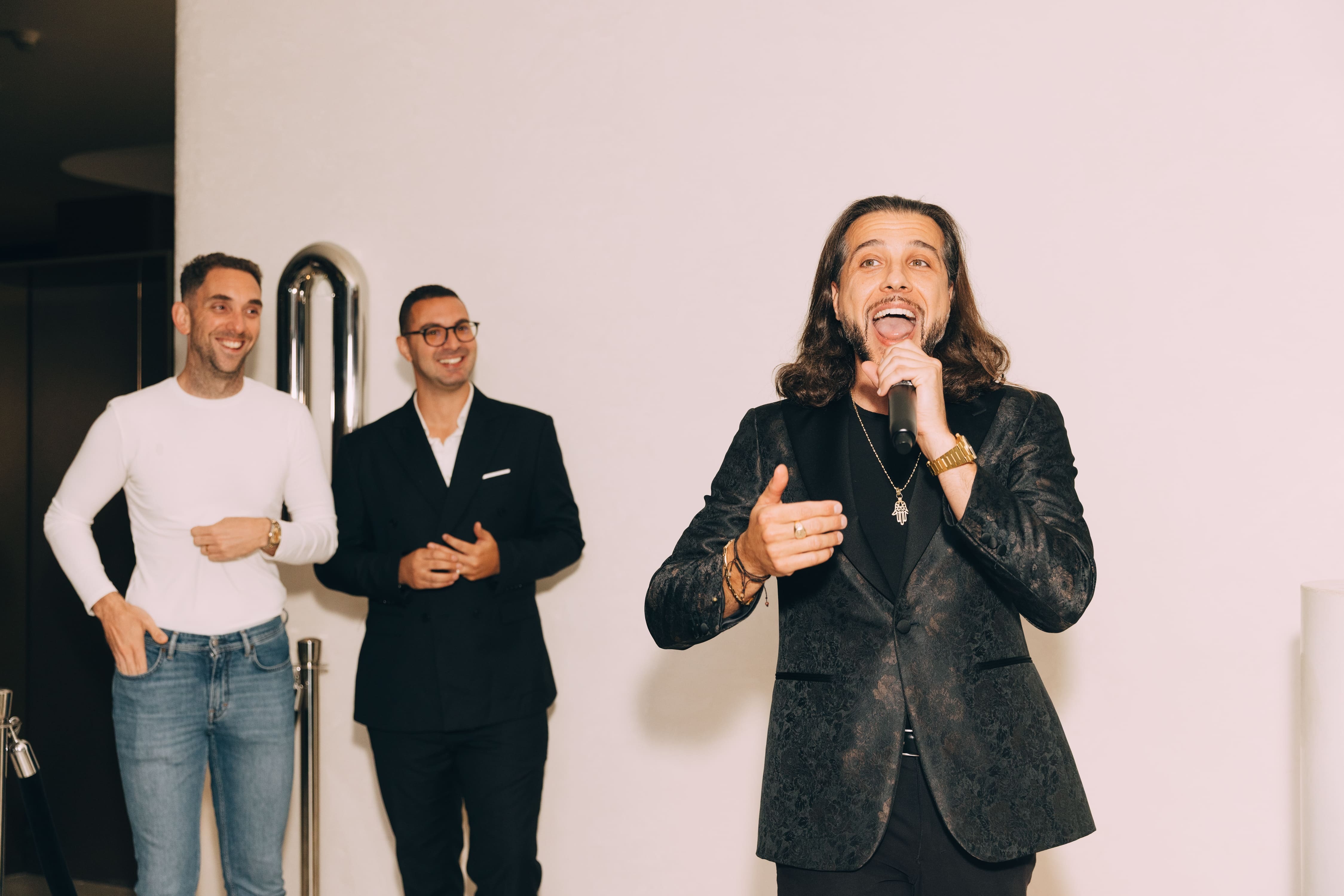 Image of the Board of Directors and the Launch Event. Karim Leduc is mid-spech.