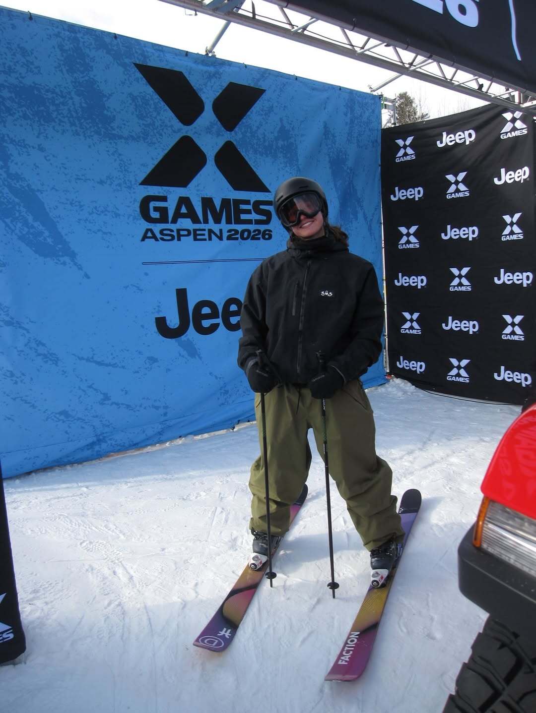 Naomi Urness, X Games Aspen athlete, standing on the slopes with her skis during X Games Aspen weekend